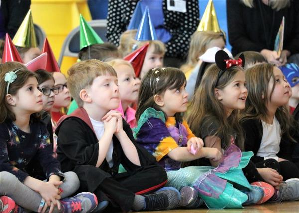  Kindergarten students enjoying a performance